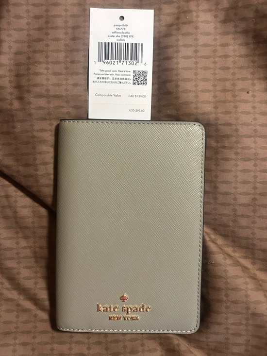 kate spade Handbags - Kate Spade New York Saffiano Passport Holder in oyster she
